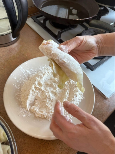 Puodo dugne sudėti morkas ir pomidorus